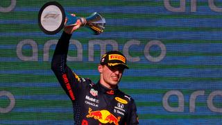 Formula One F1 - United States Grand Prix - Circuit of the Americas, Austin, Texas, U.S. - October 24, 2021 Red Bull's Max Verstappen celebrates on the podium with the trophy after winning the race REUTERS/Brian Snyder