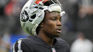 FILE - Las Vegas Raiders wide receiver Henry Ruggs III walks on the field before an NFL football game against the Chicago Bears, Oct. 10, 2021, in Las Vegas. Police in Las Vegas said Ruggs is facing a driving under the influence charge after a fiery vehicle crash early Tuesday, Nov. 2, 2021, that left a woman dead and Ruggs and his female passenger injured. (AP Photo/Rick Scuteri, File)