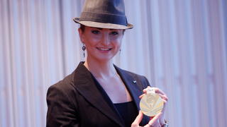 Elena Krawzow poses with her gold medal as she receives the Silver Laurel Leaf award during an award ceremony for the Germany's medal-winners of the Tokyo 2020 Olympics in Berlin, Germany, November 8, 2021. REUTERS/Michele Tantussi