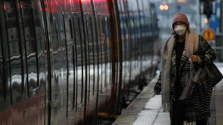  Deutsch Bahn , Railway , Trains , Passengers with Safety Mask FFP2 in the Nurnberg Hauptbahnof during the Hard Lockdown of the Covid 19 Coronavirus Pandemie in Nurnberg Nuremberg , Bayern , Deutschland . February 02 , 2021.
