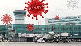 Symbolbild Omikron und Flughafen