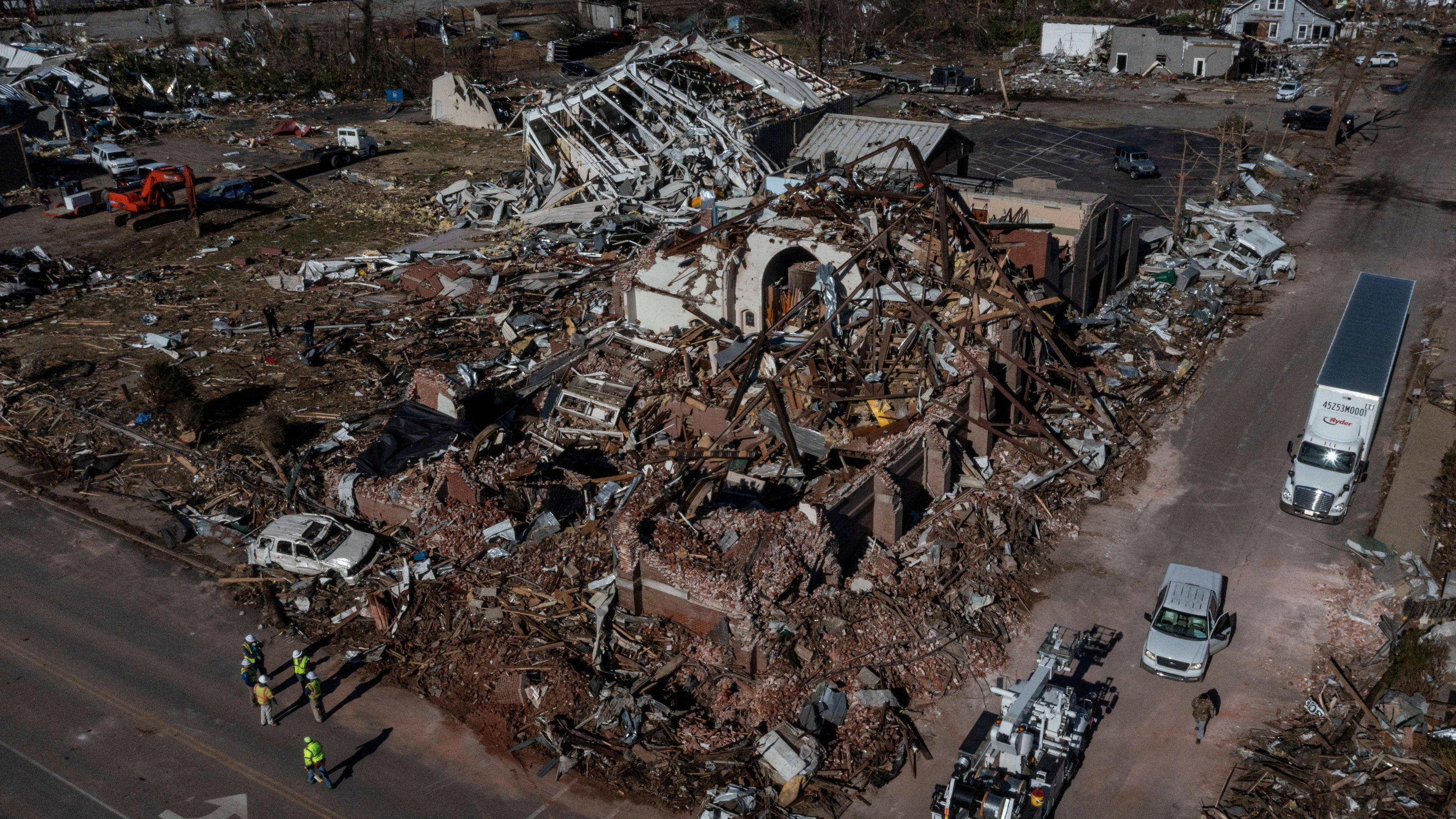Working crews surround First Presbyterian Church in the aftermath of a tornado in Mayfield, Kentucky, U.S. December 12, 2021. Picture taken with a drone. REUTERS/Adrees Latif