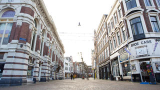  211220 -- HAARLEM THE NETHERLANDS, Dec. 20, 2021 -- Photo taken on Dec. 20, 2021 shows an empty shopping street in Haarlem, the Netherlands. The new lockdown in the Netherlands took effect from Dec. 19, 2021 and will remain in effect until Jan. 14, 2022. Photo by /Xinhua NETHERLANDS-COVID-19-LOCKDOWN SylviaxLederer PUBLICATIONxNOTxINxCHN