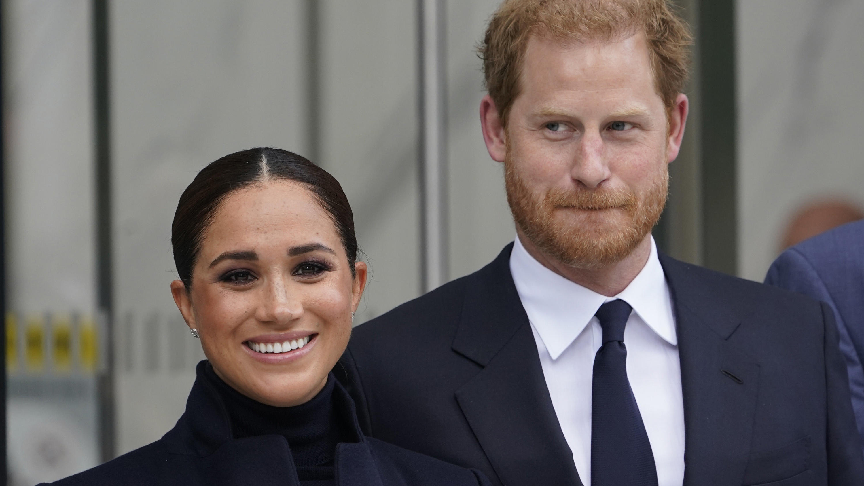 FILE - Meghan Markle and Prince Harry pose for pictures after visiting the observatory in One World Trade in New York, Thursday, Sept. 23, 2021. The Duchess of Sussex on Thursday, Dec. 2, 2021, won the latest stage in her long-running privacy lawsuit