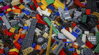 Various Lego parts, pieces and sets sit ready to sell Monday, Nov. 29, 2021, inside It's A Block Party in Indianapolis. The store is the main commercial arm of Doug Davisâ€™ lifelong Lego collection -- some 5,000 square feet of floor-to-ceiling bricks, all of the small variety.  (Mykal McEldowney /The Indianapolis Star via AP)