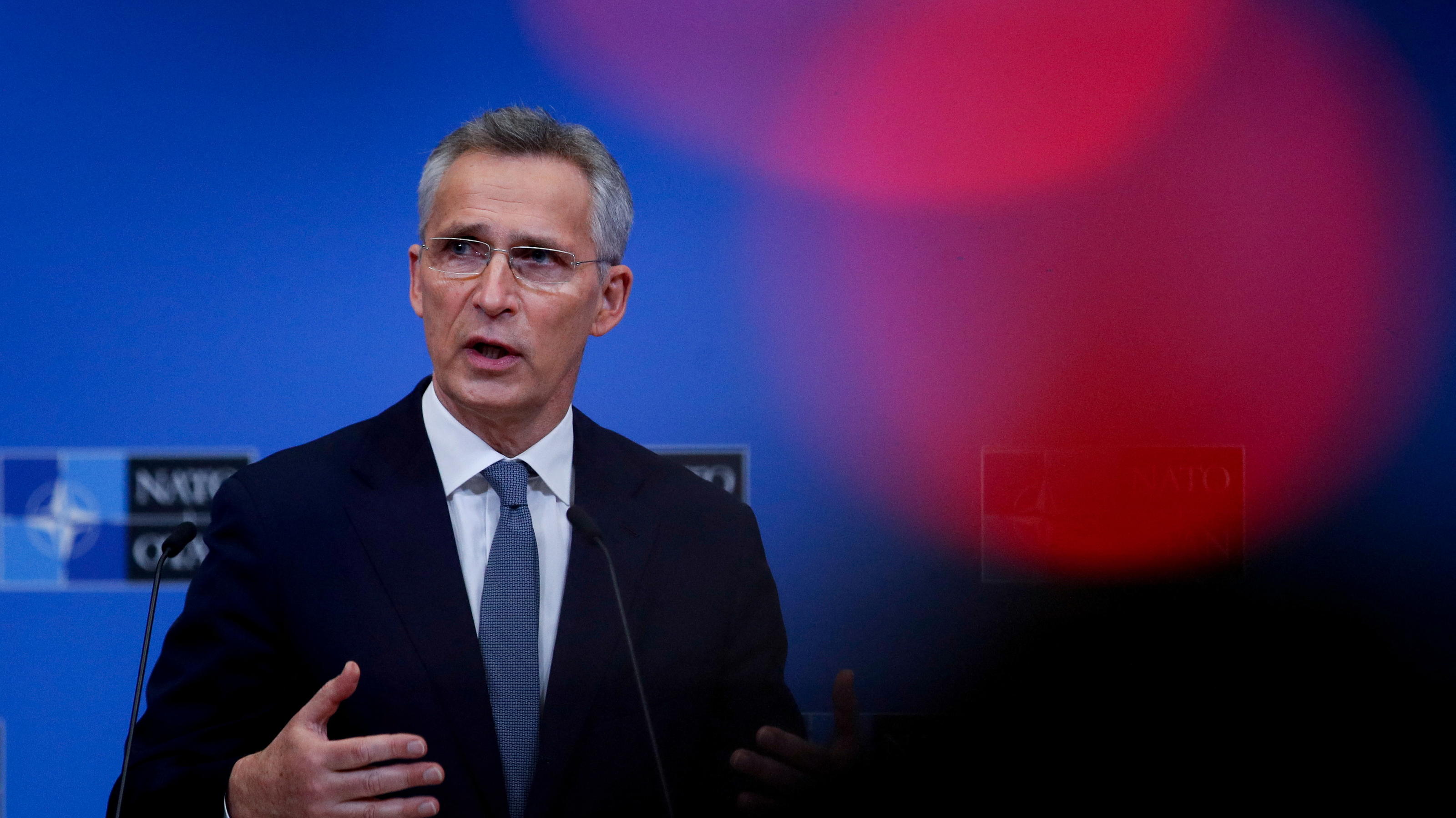 NATO Secretary-General Jens Stoltenberg gestures as he gives a news conference ahead of a meeting of NATO defence ministers in Brussels, Belgium February 15, 2022. REUTERS/Johanna Geron