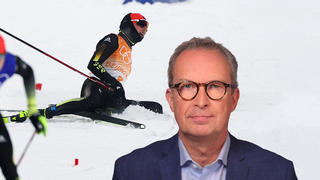 Dr. Christoph Specht im Vordergrund, im Hintergrund ist Olympia-Star Eric Frenzel zu sehen.