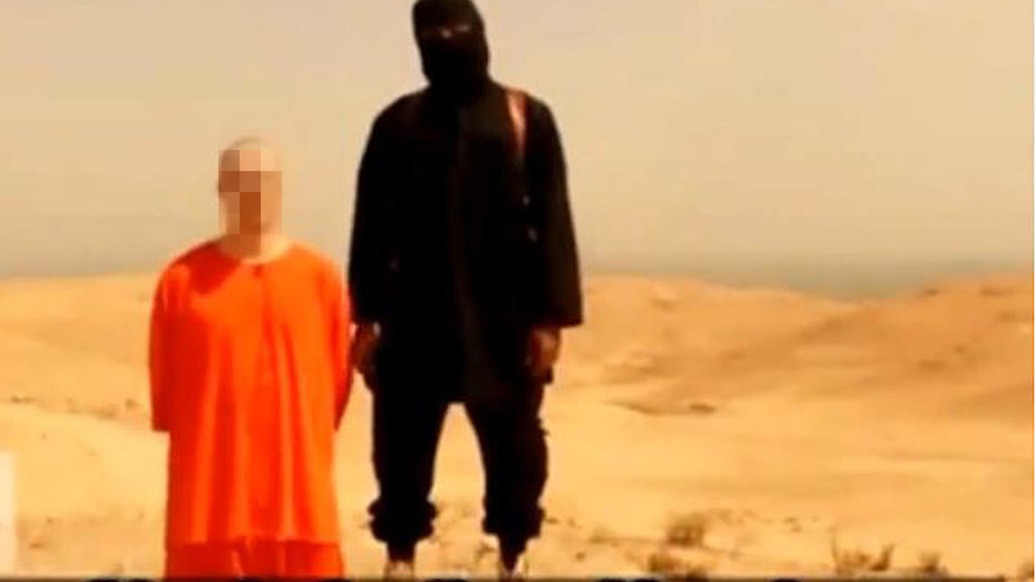 Screenshot eines Videos, das von der  Terrormiliz Islamischer Staat (IS) aufgenommen worden sein soll und angeblich die Enthauptung des US-Fotografen James Foley zeigt. Der Reporter wird nach Angaben seiner Unterstützer seit 2012 vermisst. Er habe si