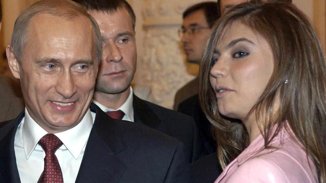 Der russische Präsident Wladimir Putin neben der Turnerin Alina Kabajewa bei einem Empfang.