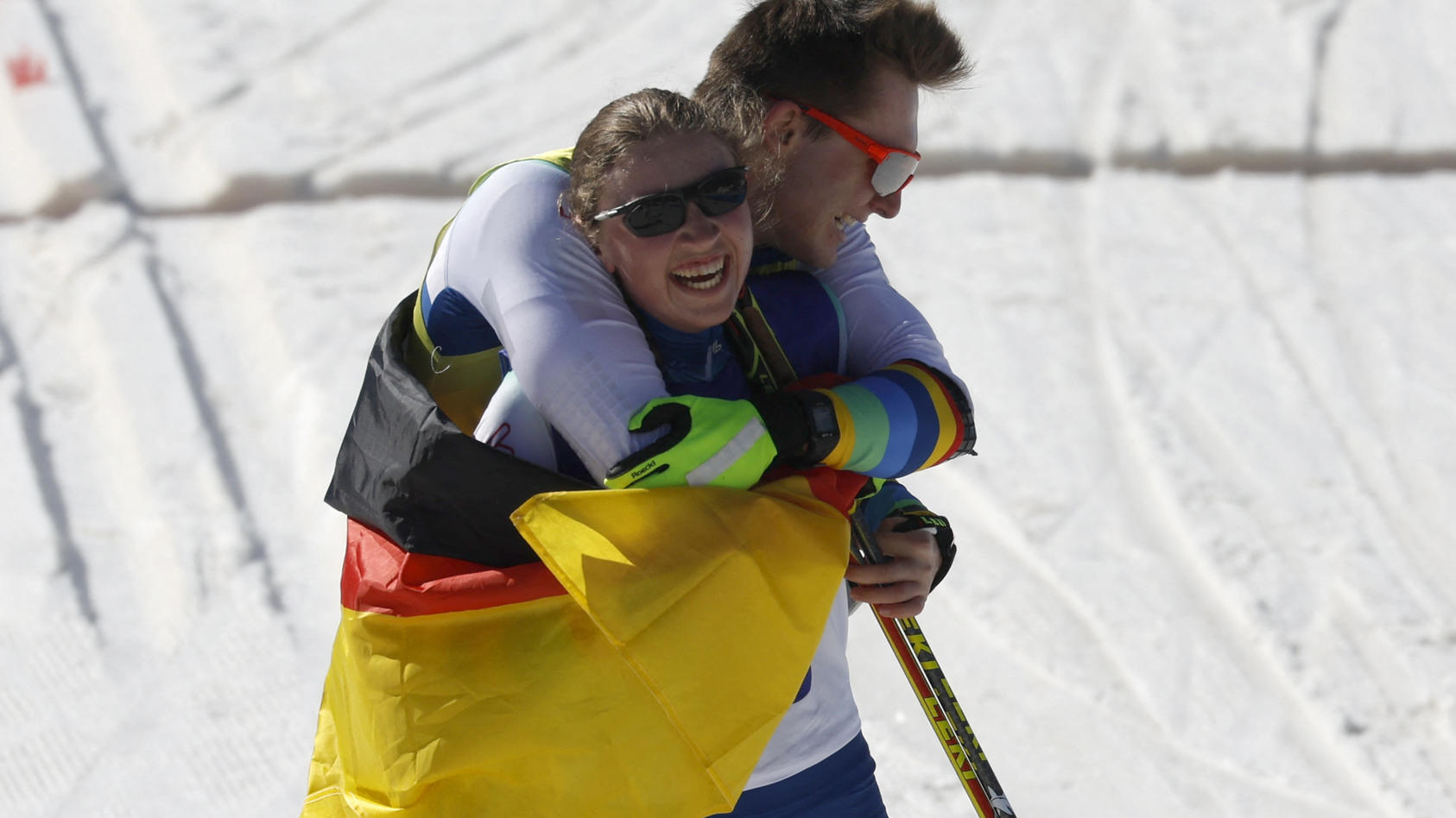 Beijing 2022 Winter Paralympic Games - Para Biathlon - Women's Middle Distance Vision Impaired - National Biathlon Centre, Zhangjiakou, China - March 8, 2022. Leonie Maria Walter of Germany celebrates with guide Pirmin Strecker of Germany after compe