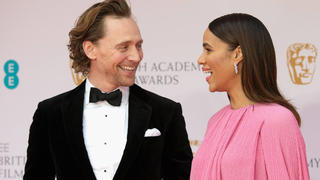  EE BAFTA British Academy Film Awards London, UK. Tom Hiddleston and Zawe Ashton at the EE BAFTA British Academy Film Awards Red Carpet Arrivals at The Royal Albert Hall in London. 13th March 2022. LMK12-130322-004. PUBLICATIONxINxGERxSUIxAUTxONLY