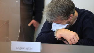 Defendant, the 50-year-old man who is accused of having killed a 20-year-old gas station attendant, on September 18, 2021, in Idar-Oberstein, who had asked him to wear the compulsory protective mask against the spread of the coronavirus disease (COVID-19), wears a face mask at a local court in Bad Kreuznach, Germany, March 21, 2022.   REUTERS/Wolfgang Rattay