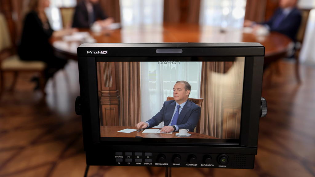 MOSCOW REGION, RUSSIA - MARCH 24, 2022: The President of the United Russia Party and the Vice-President of the Russian Security Council Dmitry Medvedev on screen during an interview with Rossiya Segodnya news agency and RT television channel at the Gorki residence.  Yekateri
