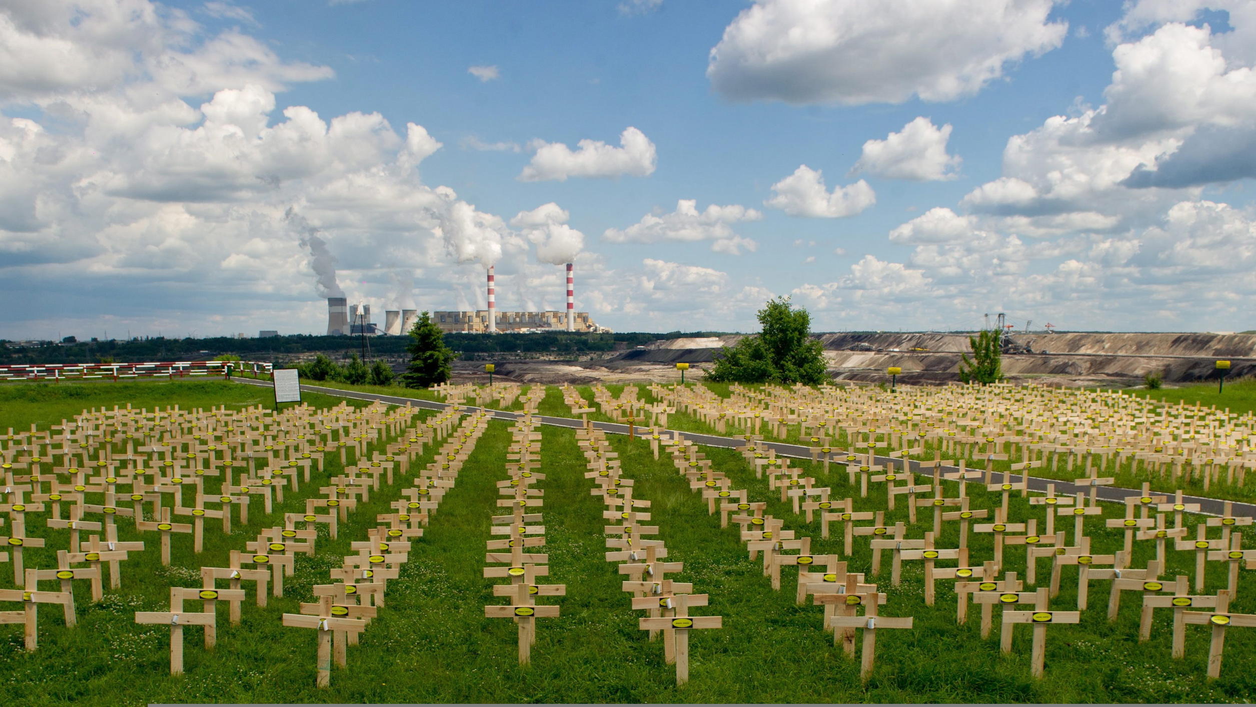 Wodden crosses with the inscription 'Coal kills' and erected by activists of the environment protection organization Greenpeace are seen near the brown coal mine and power plant 'Belchatow' in the Kleszczowo village, central Poland