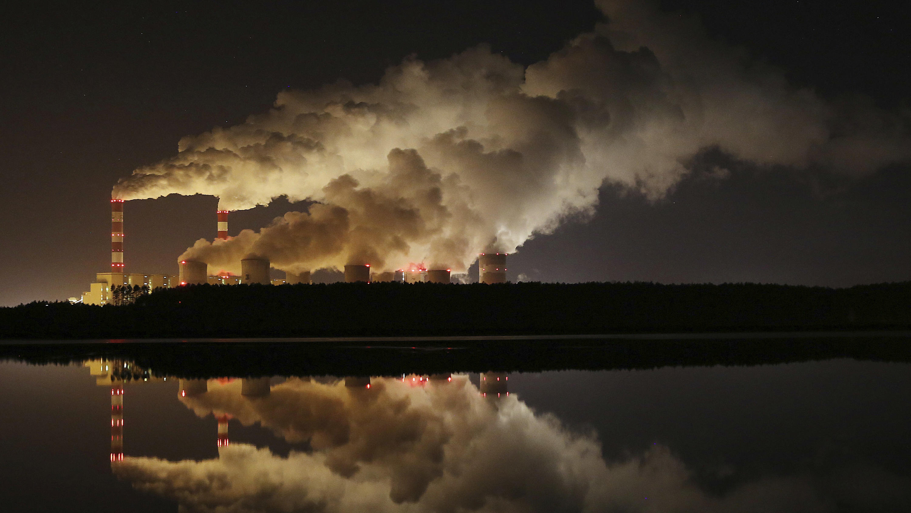 File-File photo shows clouds of smoke over Europe's largest lignite power plant in Belchatow, central Poland, 