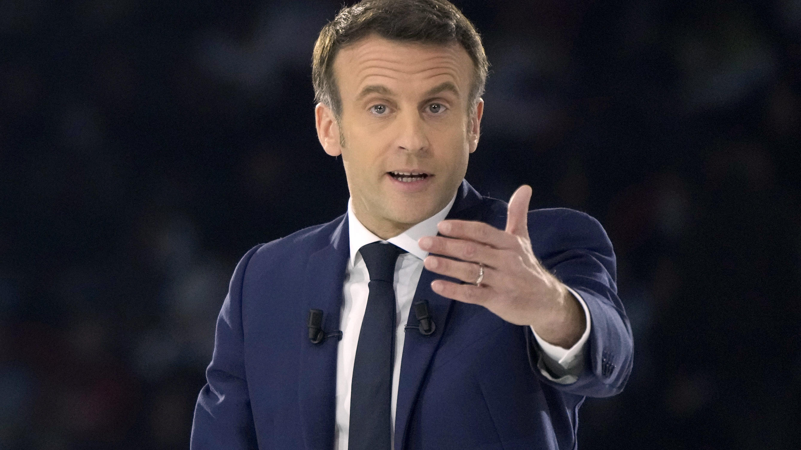 FILE - French President Emmanuel Macron and centrist candidate for reelection delivers his speech during a meeting in Paris, Saturday, April 2, 2022. Emmanuel Macron has been at the forefront of international talks on how to support Ukraine and take 