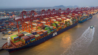 HANGHAI, CHINA - FEBRUARY 2, 2022 - An aerial photo taken on February 2, 2022 shows large container ships in operation at Yangshan Port in Shanghai, China. In January 2022, the container throughput of Shanghai Port exceeded 4.35 million TEUS, a recor