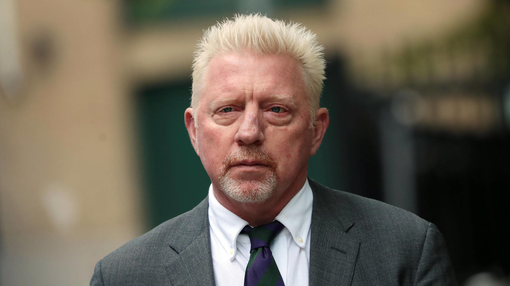 German Boris Becker arrives at Southwark Crown Court escorted by his partner Lilian de Carvalho Monteiro in London on Friday, April 29, 2022.Six time Grand Slam tennis champion is being sentenced today after being found guilty of four charges under t
