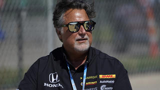 FILE - Team owner Michael Andretti looks on during practice for the IndyCar Detroit Grand Prix auto racing doubleheader on Belle Isle in Detroit, on June 11, 2021. If things had gone according to plan, Colton Herta would be in Miami preparing for the fifth Formula One race of his career.  Instead, the 22-year-old Californian is headed to the inaugural Miami Grand Prix as a spectator. His boss, Michael Andretti, meanwhile, awaits any word whatsoever on his bid to start a Formula One team and bring a true American team to the grid.  (AP Photo/Paul Sancya, File)