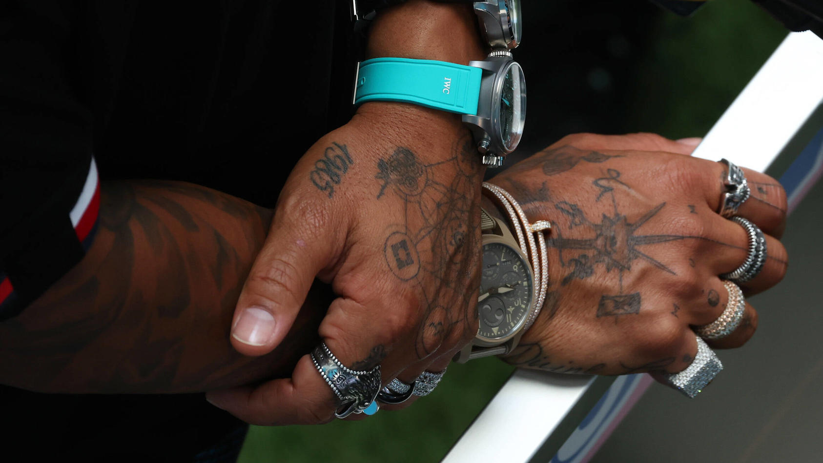  Formula 1 2022: Miami GP MIAMI INTERNATIONAL AUTODROME, UNITED STATES OF AMERICA - MAY 06: The tattoos and jewellery of Sir Lewis Hamilton, Mercedes-AMG during the Miami GP at Miami International Autodrome on Friday May 06, 2022 in Miami, United Sta