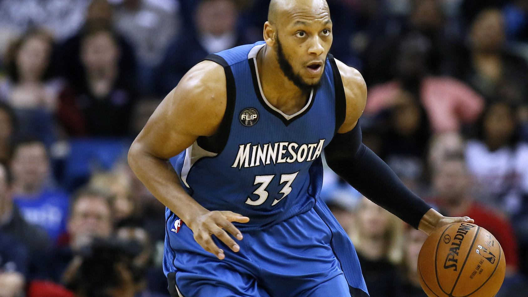 FILE - Minnesota Timberwolves forward Adreian Payne (33) drives with the ball during the second half of an NBA basketball game, Feb. 27, 2016, in New Orleans. Former Michigan State basketball standout and NBA player Adreian Payne has died. He was 31.