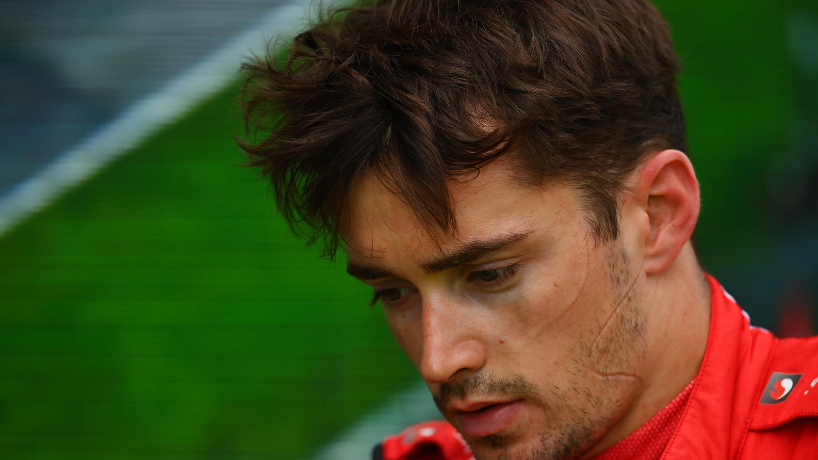 IMOLA, ITALY - APRIL 24: 6th placed Charles Leclerc of Monaco and Ferrari looks dejected in parc ferme after spinning out from third position with 10 laps remaining during the F1 Grand Prix of Emilia Romagna at Autodromo Enzo e Dino Ferrari on April 