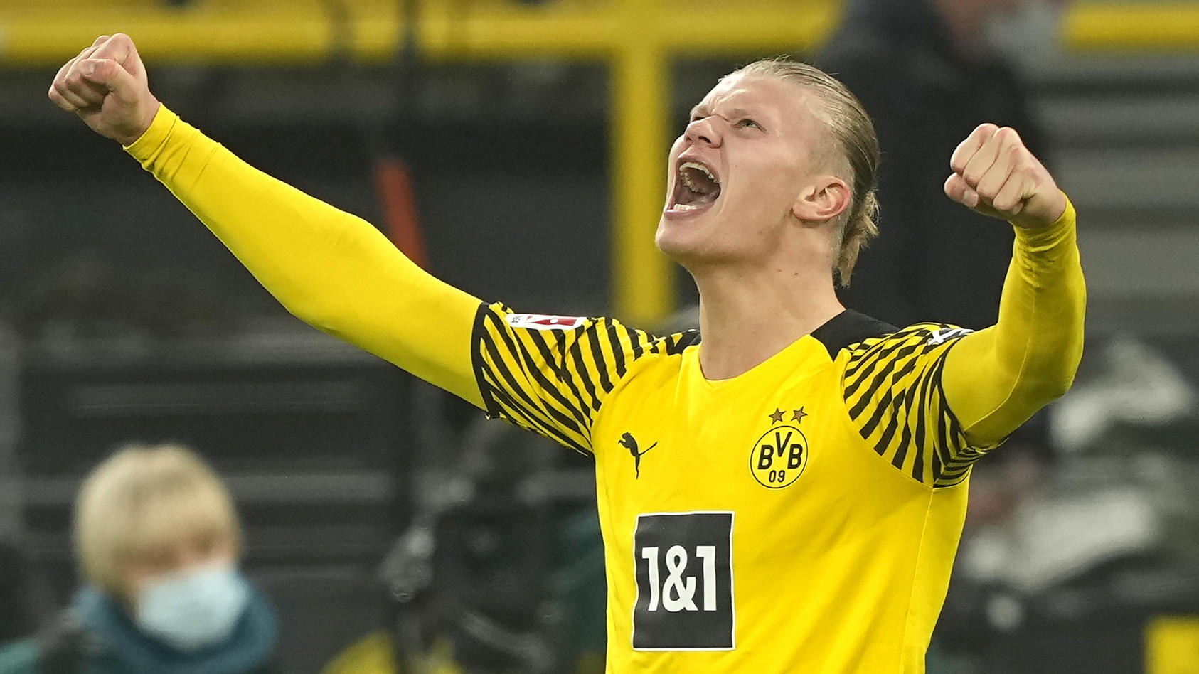 FILE - Dortmund's Erling Haaland celebrates the fourth goal of his team against Freiburg during the German Bundesliga soccer match between Borussia Dortmund and SC Freiburg in Dortmund, Germany, Friday, Jan. 14, 2022. Erling Haaland looks sure to be 
