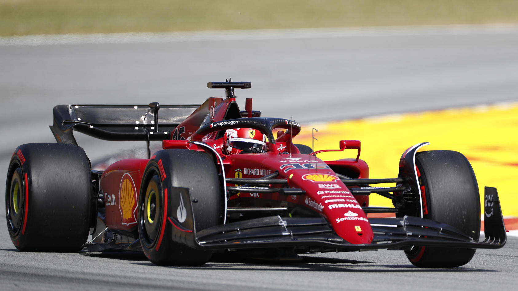 Ferrari driver Charles Leclerc of Monaco steers his car during qualifying session at the Barcelona Catalunya racetrack in Montmelo, Spain, Saturday, May 21, 2022. The Formula One race will be held on Sunday. (AP Photo/Joan Monfort)