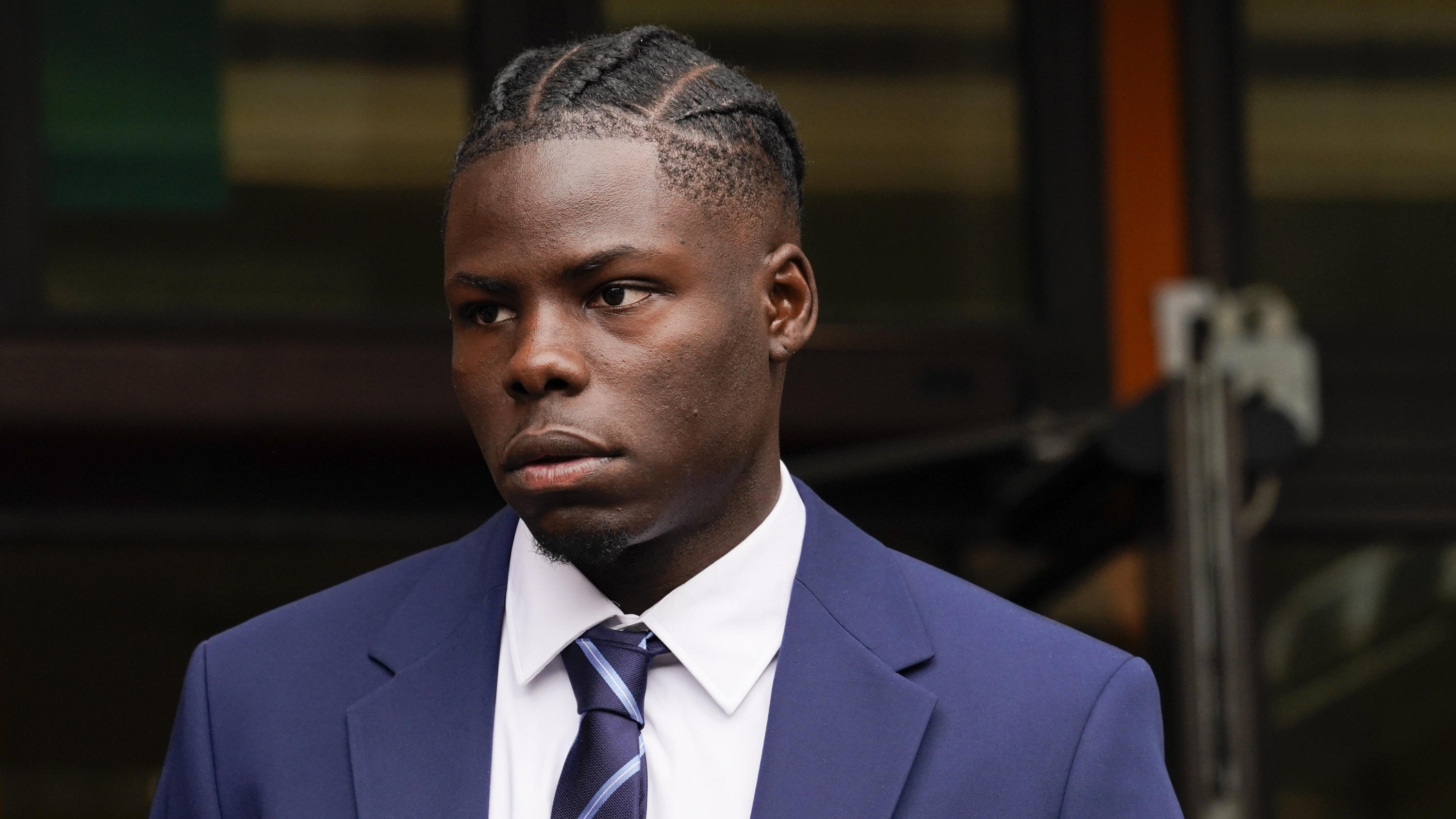 Yoan Zouma, brother of West Ham United player Kurt Zouma, leaves Thames Magistrates Court in London, Tuesday, May 24, 2022. Kurt Zouma has pleaded guilty to kicking and slapping his pet cat in abuse caught on video. The 27-year-old France internation