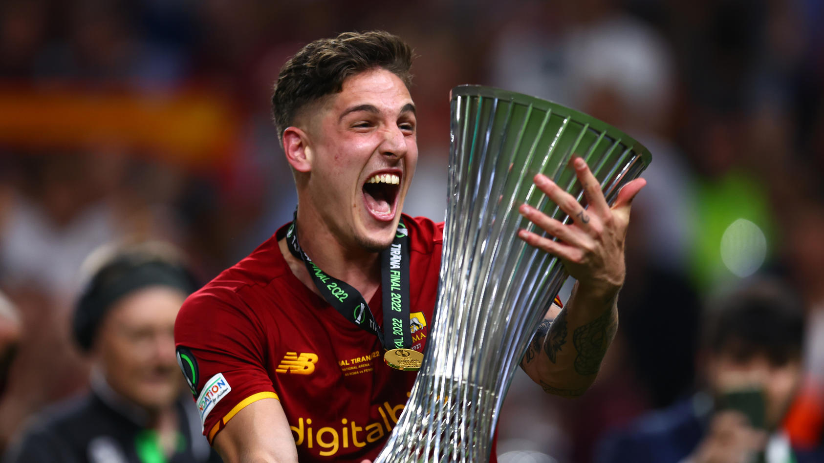 TIRANA, ALBANIA - MAY 25: Nicolo Zaniolo of AS Roma celebrates with the UEFA Europa Conference League Trophy after their sides victory in the UEFA Conference League final match between AS Roma and Feyenoord at Arena Kombetare on May 25, 2022 in Tiran
