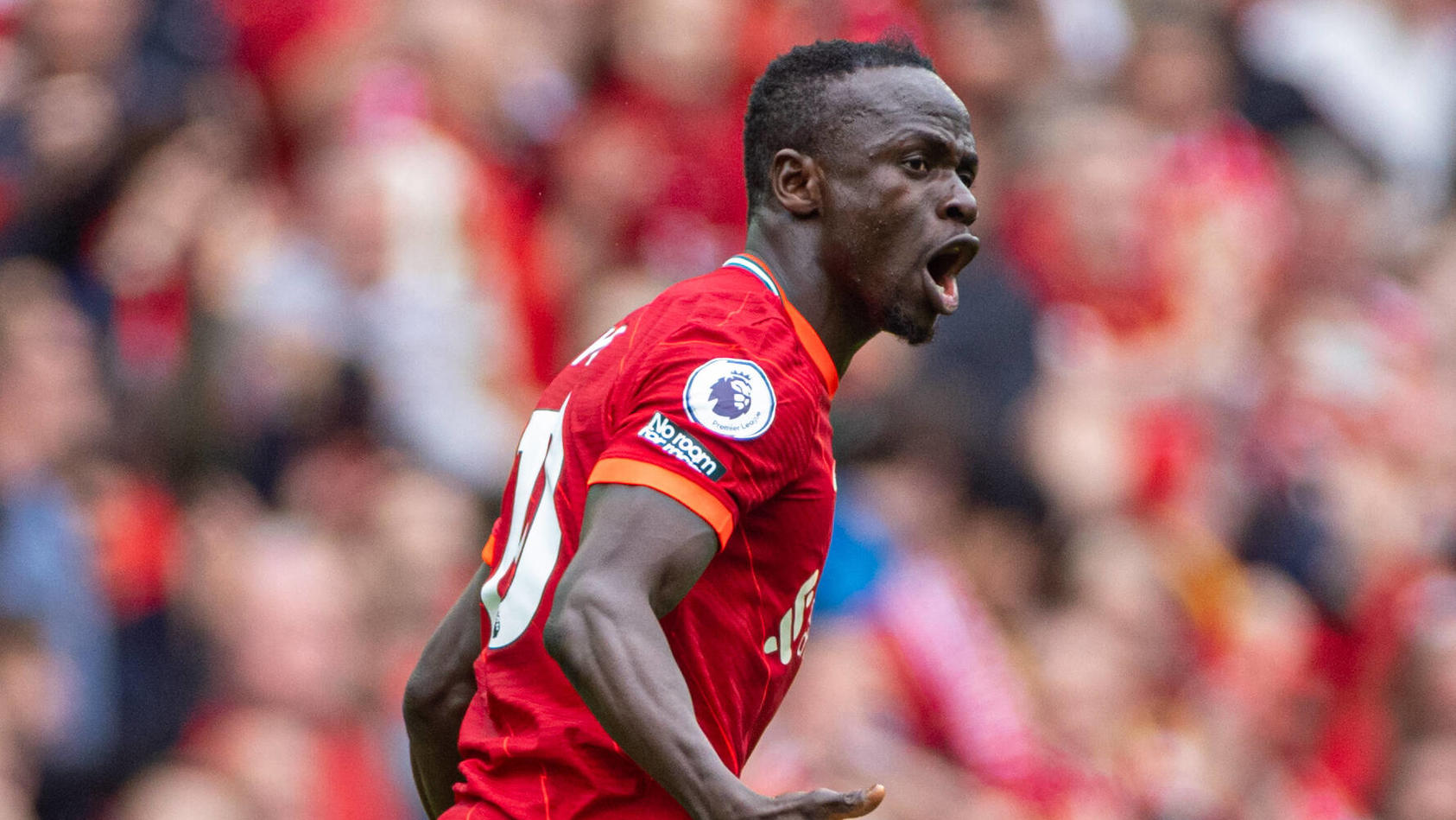  220523 -- LIVERPOOL, May 23, 2022  -- Liverpool s Sadio Mane celebrates after scoring the first equalising goal during the English Premier League match between Liverpool and Wolverhampton Wanderers in Liverpool, Britain, on May 22, 2022.  FOR EDITOR