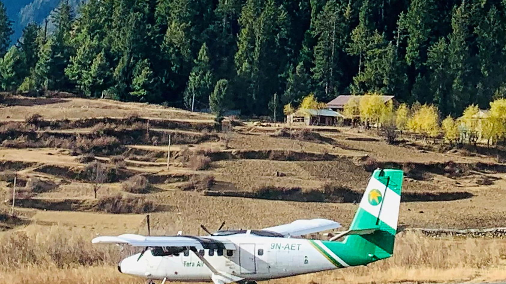 Handout image shows Tara Air's DHC-6 Twin Otter, tail number 9N-AET, in Simikot, Nepal December 1, 2021. Picture taken December 1, 2021. Madhu Thapa/Handout via REUTERS ATTENTION EDITORS - THIS IMAGE HAS BEEN SUPPLIED BY A THIRD PARTY. NO RESALES. NO