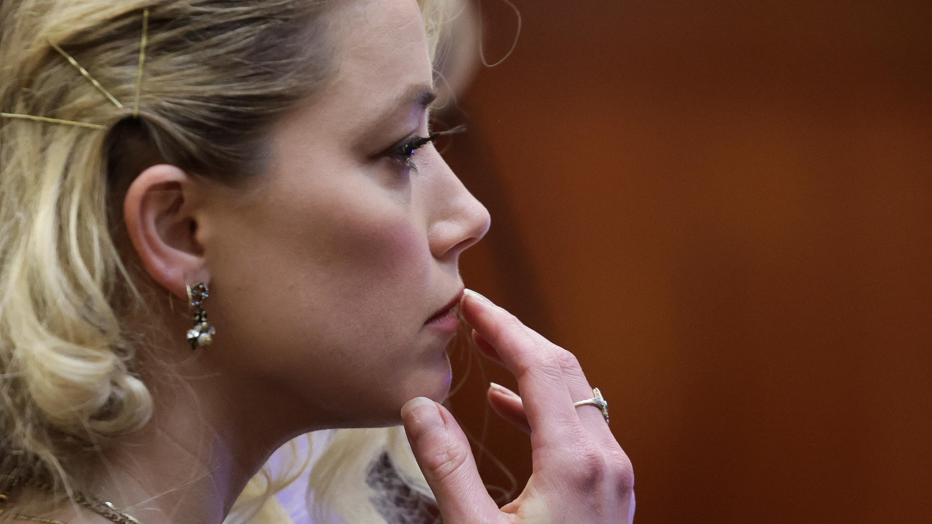 Actor Amber Heard waits before the jury said that they believe she defamed ex-husband Johnny Depp while announcing split verdicts in favor of both her ex-husband Johnny Depp and Heard on their claim and counter-claim in the Depp v. Heard civil defama