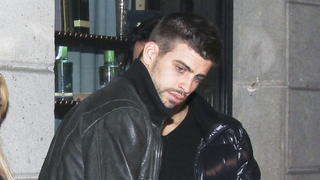 EXCLUSIVE: Shakira recently announced the end of an 11-year-old relationship and it looks like pop star Shakira may have moved on with soccer star Gerard Pique. The lovers are pictured here holding hands while exiting a restaurant in Barcelona, Spain. Pique, 24, also uploaded a photograph from his birthday party with himself, Shakira and his friends posing at the celebrations.