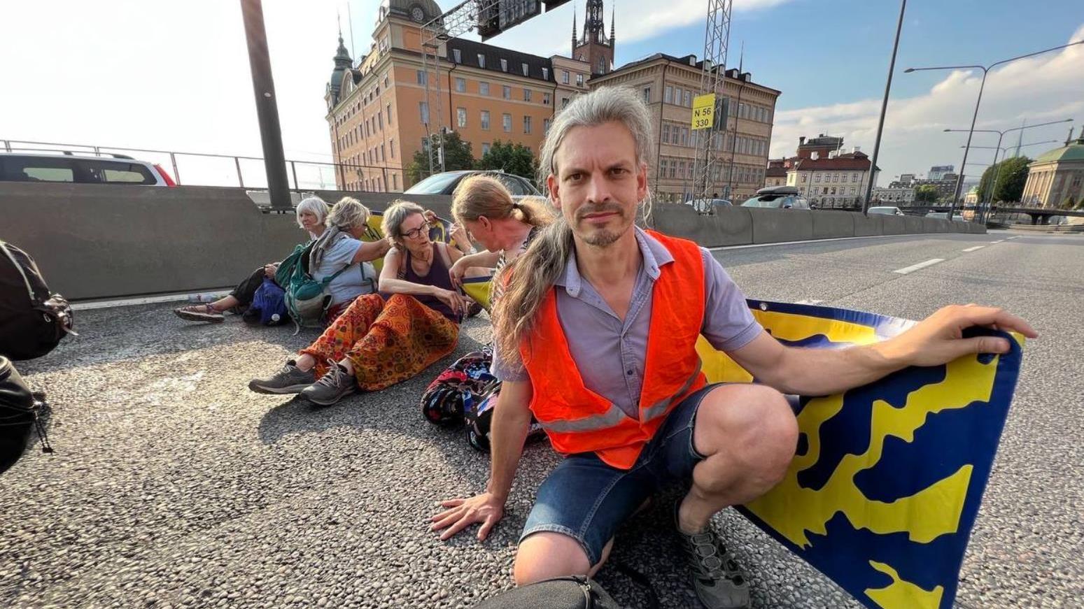 Der Aktivist Christian Bläul während einer Aktion in Stockholm