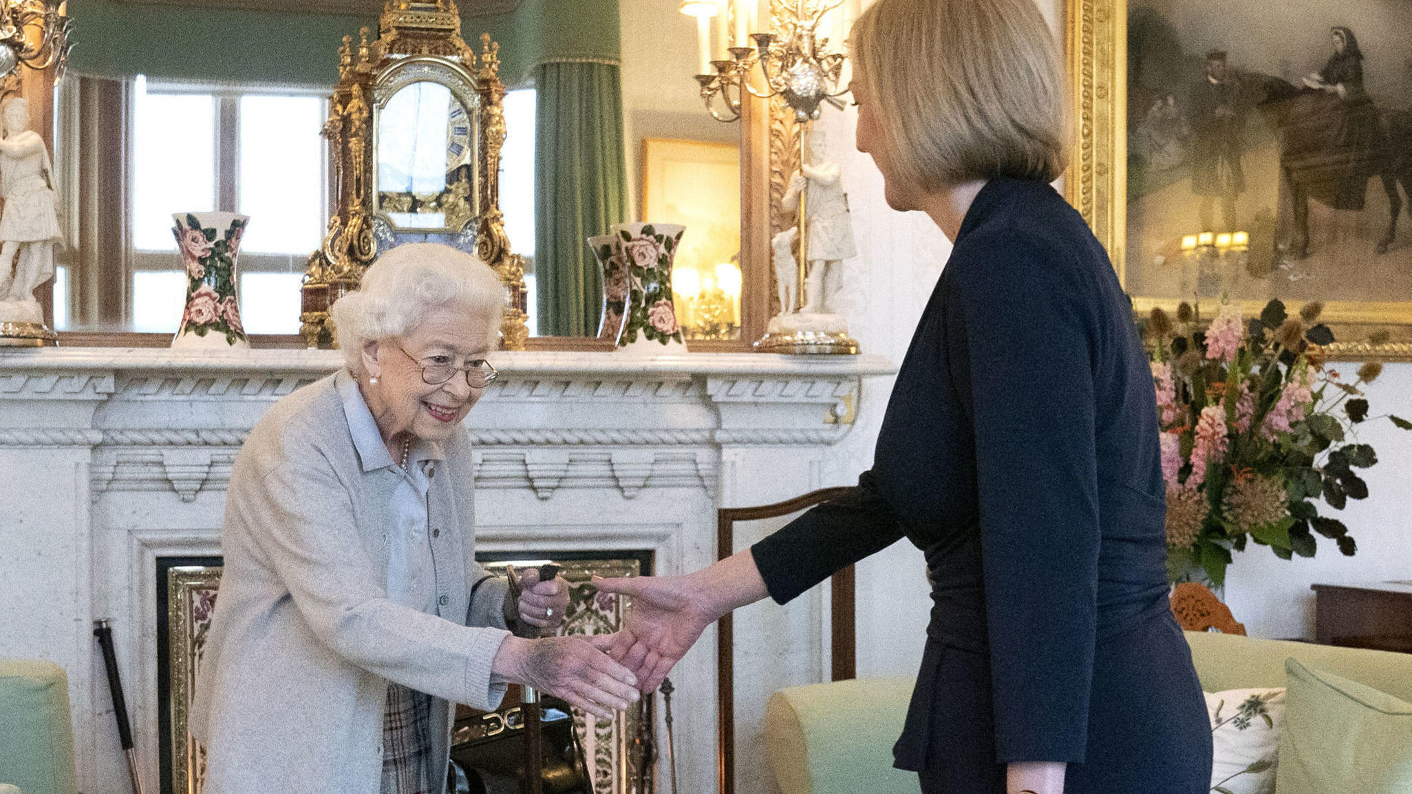 FILE - Britain's Queen Elizabeth II, left, welcomes Liz Truss during an audience at Balmoral, Scotland, where she invited the newly elected leader of the Conservative party to become Prime Minister and form a new government, Tuesday, Sept. 6, 2022. Q