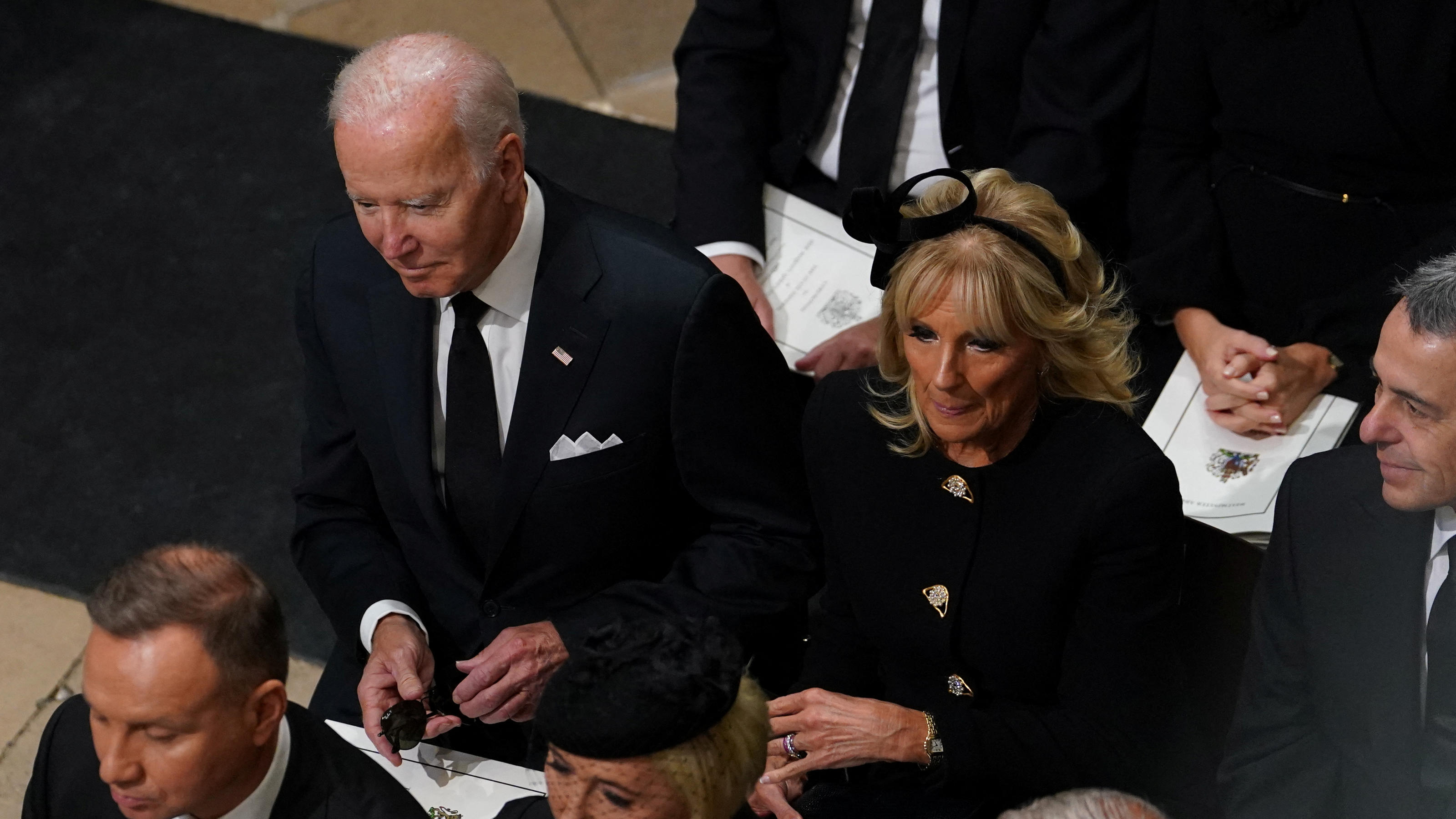 US President Joe Biden accompanied by the First Lady Jill Biden  arriving for the State Funeral of Queen Elizabeth II, held at Westminster Abbey, London. Picture date: Monday September 19, 2022.    Gareth Fuller/Pool via REUTERS