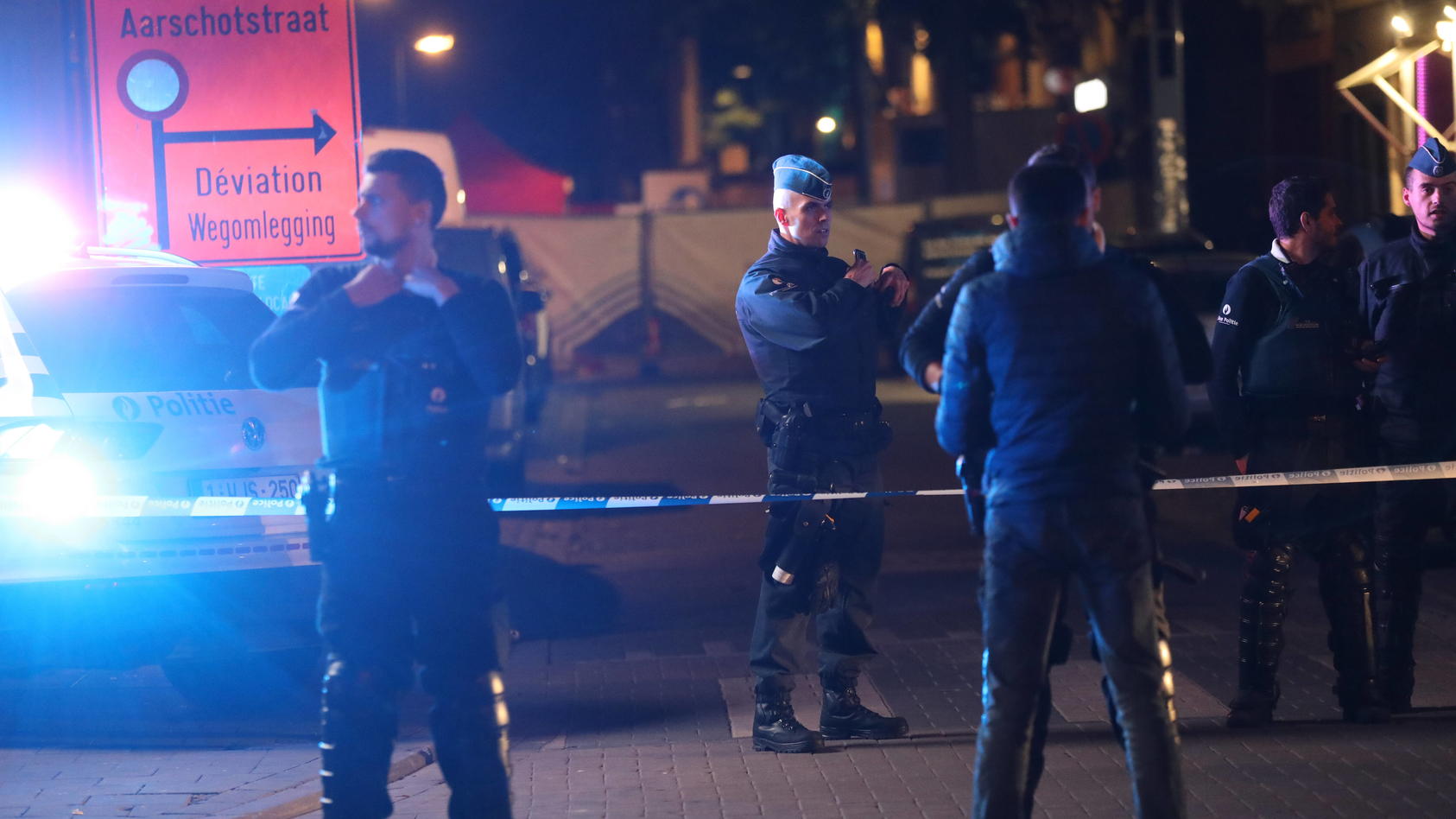 Police officers pictured at the scene of a stabbing incident at the Aarschotstraat in Schaarbeek, Brussels, Thursday 10 November 2022. One of the policemen stabbed in the incident has died of his injuries. Another policeman was brought to the hospita