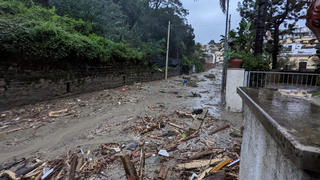 Debris are seen on the street, following a landslide on the Italian holiday island of Ischia, Italy, in this handout photo obtained by Reuters on November 26, 2022. Carabinieri/Handout via REUTERS THIS IMAGE HAS BEEN SUPPLIED BY A THIRD PARTY.