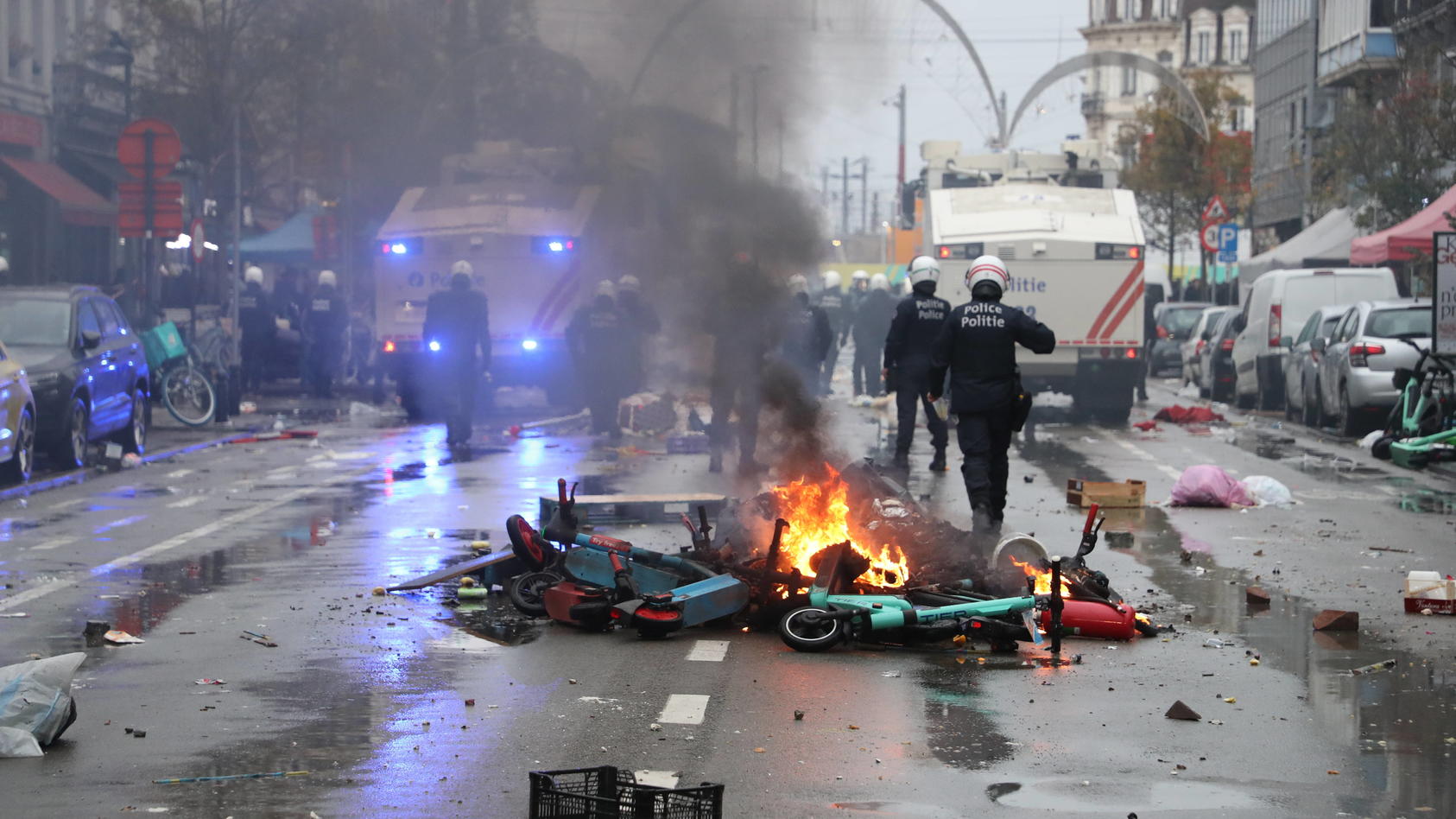 Illustration picture shows fire from a pile of rental e-steps lying in the middle of the street, in the center of Brussels, during a soccer game between Belgium s national team, Nationalteam the Red Devils and Morocco, in Group F of the FIFA 2022 Wor