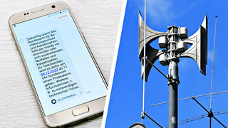 Smartphone mit SMS-Benachrichtigung über den Katastrophenwarntag und elektronische Sirene auf einem Dach / action press