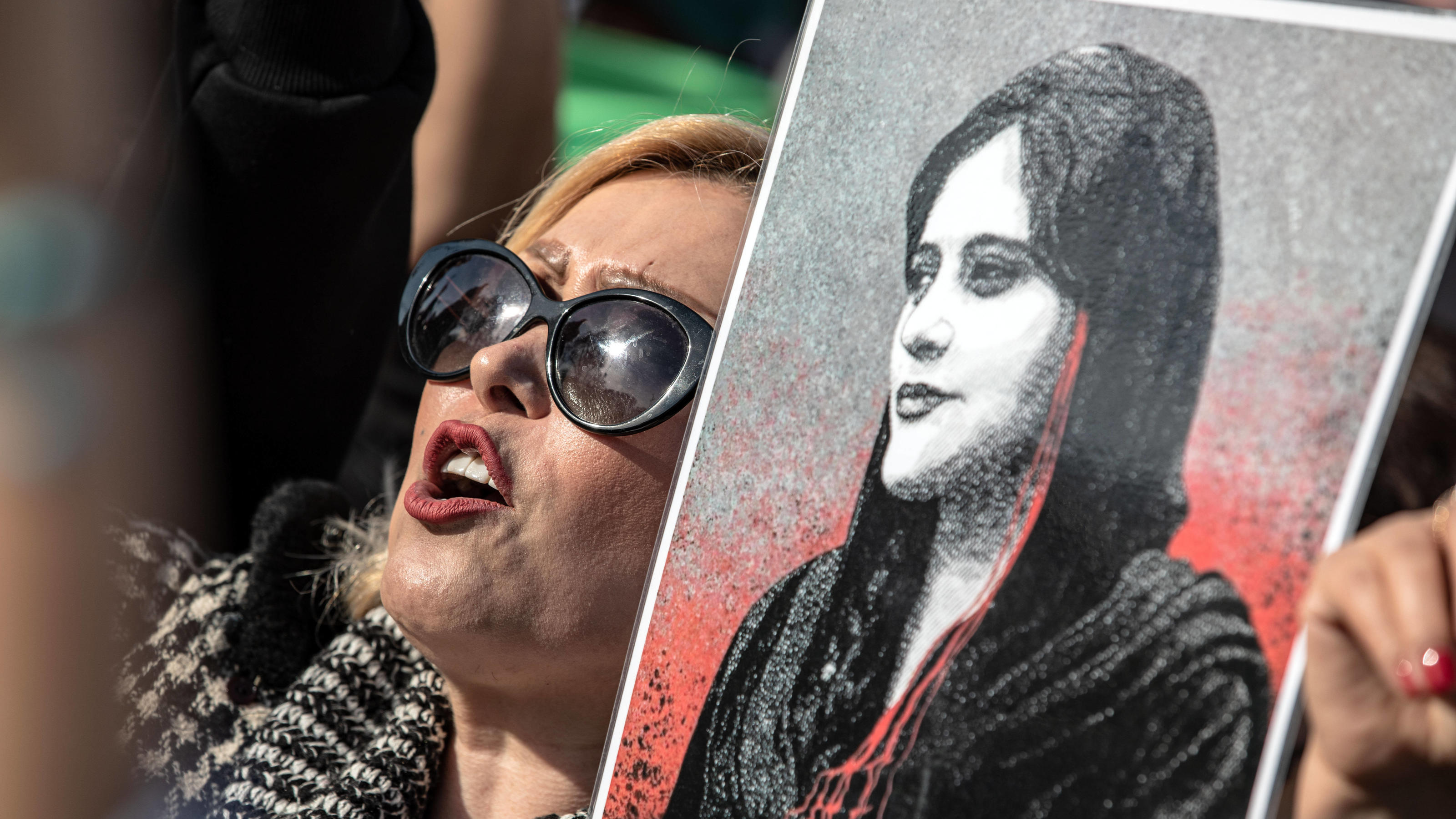  December 17, 2022, Istanbul, Turkey: A female protester takes part during the demonstration. Mahsa Amini s death has sparked weeks of violent protests across Iran and other countries. Mahsa fell into a coma and died after being arrested in Tehran by