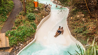 E1873T The outdoor swimming pool rapids slide at Center Parcs, Longleat, Wiltshire, England, United Kingdom.