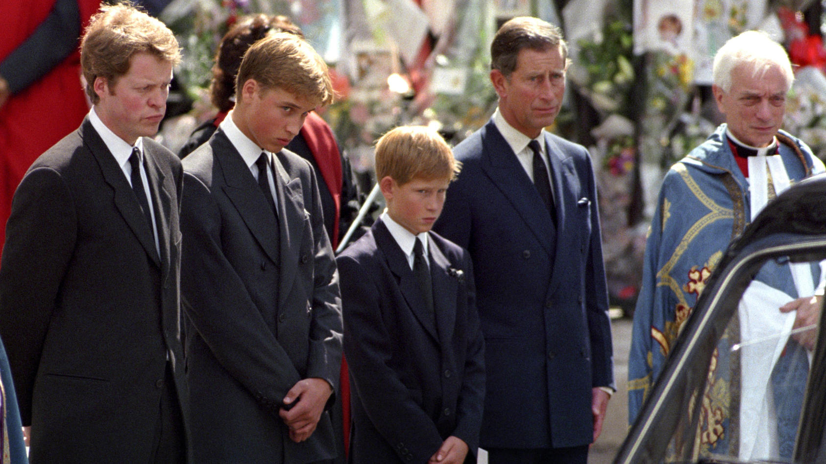 Royal engagement.File photo dated 06/09/97 of (left to right) The Earl Spencer, Prince William, Prince Harry and The Prince of Wales, waiting as the hearse carrying the coffin of Diana, Princess of Wales prepares to leave Westminster Abbey, following