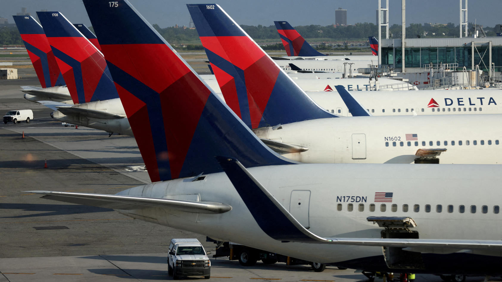 FILE PHOTO: Delta Air Lines planes are seen at John F. Kennedy International Airport on the July 4th weekend in Queens, New York City, U.S., July 2, 2022. REUTERS/Andrew Kelly/File Photo