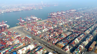 Aerial photos are taken at Qingdao Port in east China's Shandong Province, Jan 2, 2023. In 2022, Shandong ports added 37 new sea routes, bringing the total number of routes to 327, among which 233 are foreign trade routes.