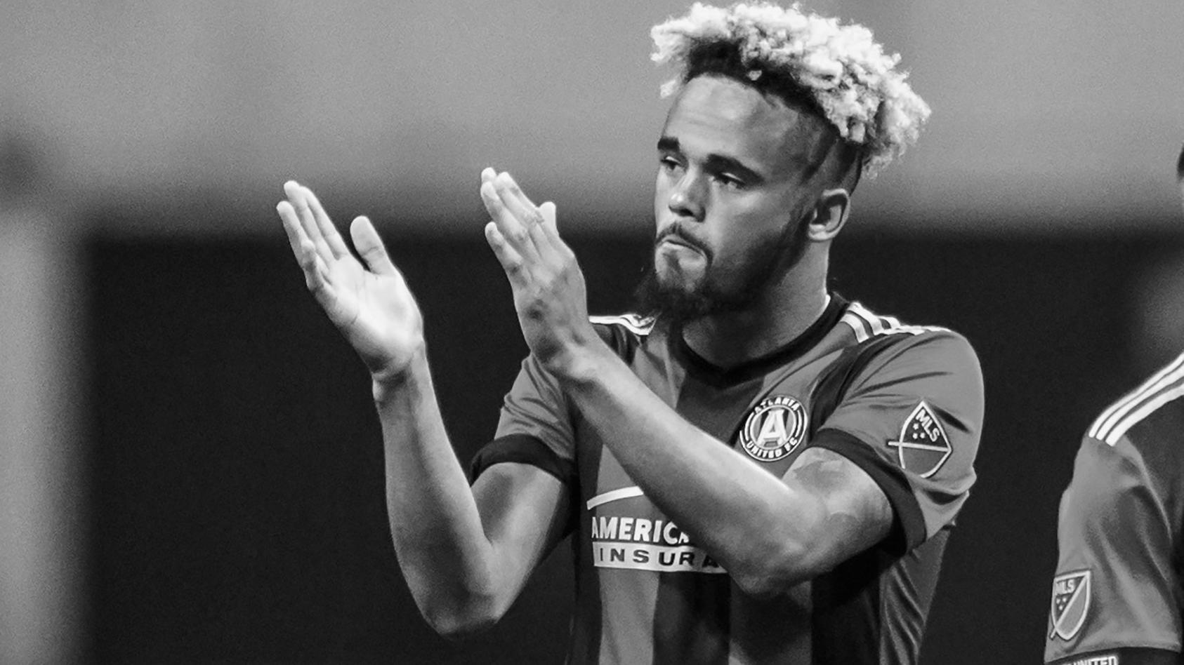 FILE - Atlanta United midfielder Anton Walkes (26) acknowledges the fans after an MLS playoff soccer game against Columbus Crew, in Atlanta, Thursday, Oct. 26, 2017. Soccer player Anton Walkes, who started his career at Tottenham, died Thursday, Jan.