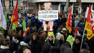 Toulouse: French Workers Strike Nationwide, Saying NO To Macron s Pension Reform A protester holds a puppet depicting Macron and reading Macron s reform, retired people in trunks . More than 50.000 people took to the streets in toulouse against the planned reform of pension and retirement age. France s labour unions have made a rare joint call for a day of major strike action and protests across France against plans by President Emmanuel Macron s government to reform the pension system and raise the retirement age to 64 from 62, a move opinion polls show is opposed by a vast majority 93f workers already facing a cost-of-living crisis. Nearly all sectors unions called for this strike and protest : mining and energy, health, schooling PUBLICATIONxNOTxINxFRA Copyright: xAlainxPittonx originalFilename: pitton-notitle230119_npTtq.jpg