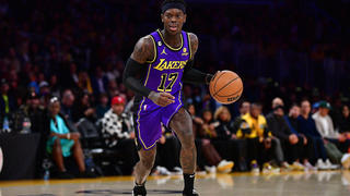 January 20, 2023; Los Angeles, California, USA; Los Angeles Lakers guard Dennis Schroder (17) controls the ball against the Memphis Grizzlies during the first half at Crypto.com Arena. Mandatory Credit: Gary A. Vasquez-USA TODAY Sports