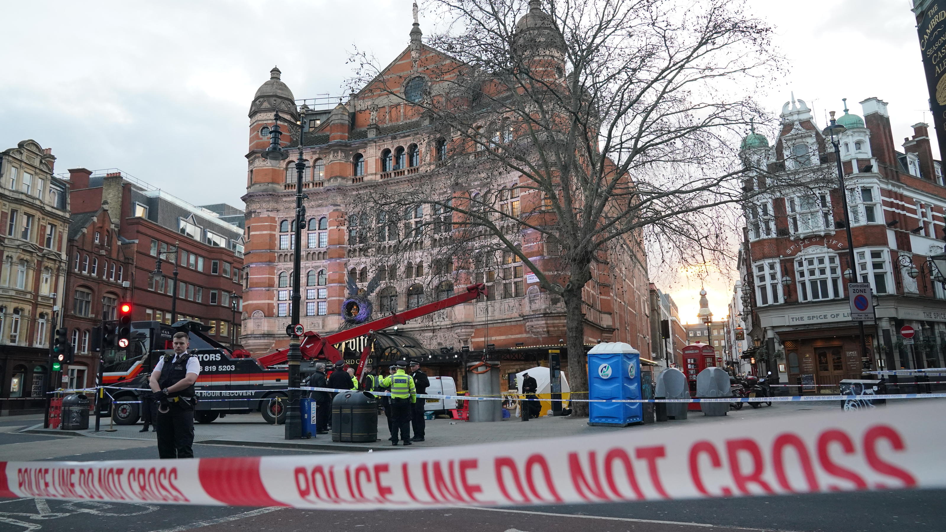 Man crushed by telescopic urinal. A police tent is erected at Cambridge Circus on the junction between Shaftesbury Avenue and Charing Cross Road in London, after a man has been crushed by a telescopic urinal. Fire crews said the man has been freed an